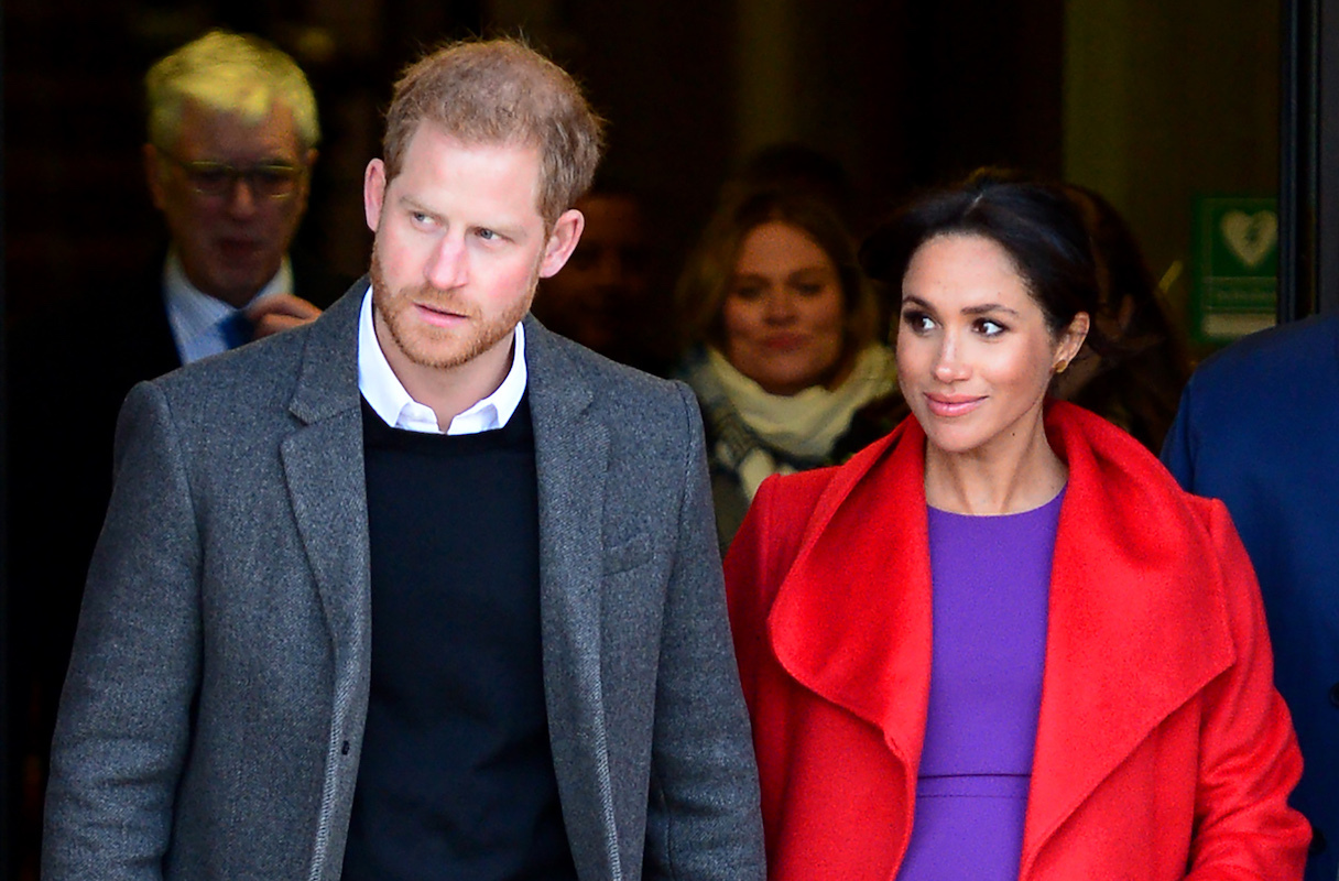 Prince Harry, Duke of Sussex and Meghan, Duchess of Sussex depart from Birkenhead Town Hall on January 14, 2019 in Birkenhead, England.