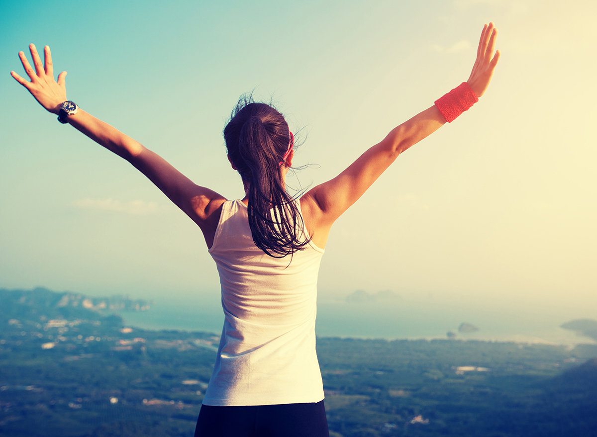 woman-looking-at-landscape-in-workout-gear