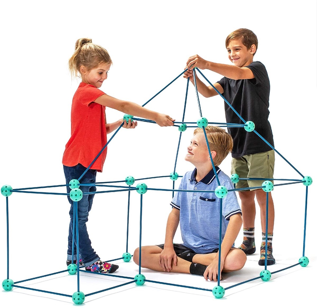 children building fort with green pieces