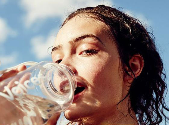 Increase water intake   | 9 Best Tips To Get Glowing Skin In Summer Naturally | Her Beauty