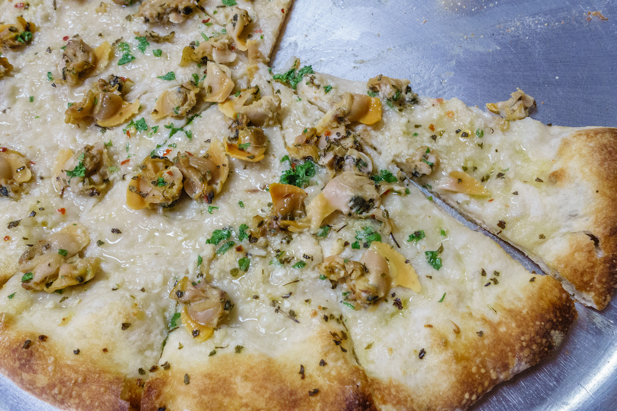 Closeup of a clam pizza