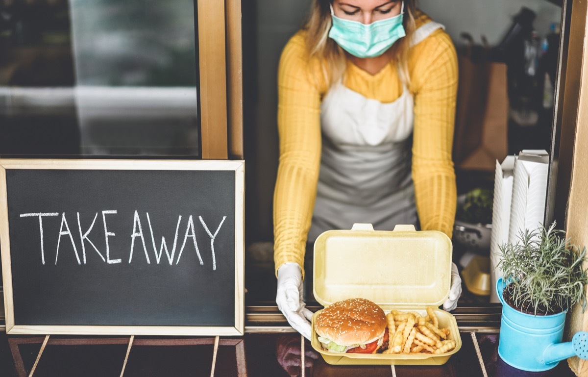 Woman preparing take out order