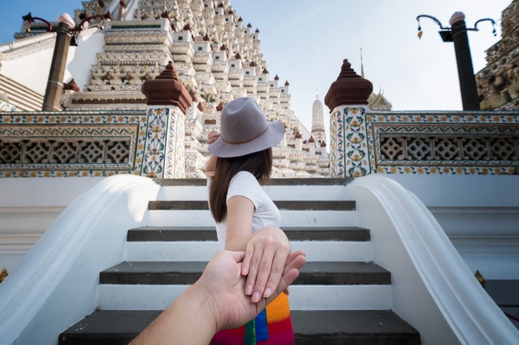 man and woman traveling New Year's Resolutions