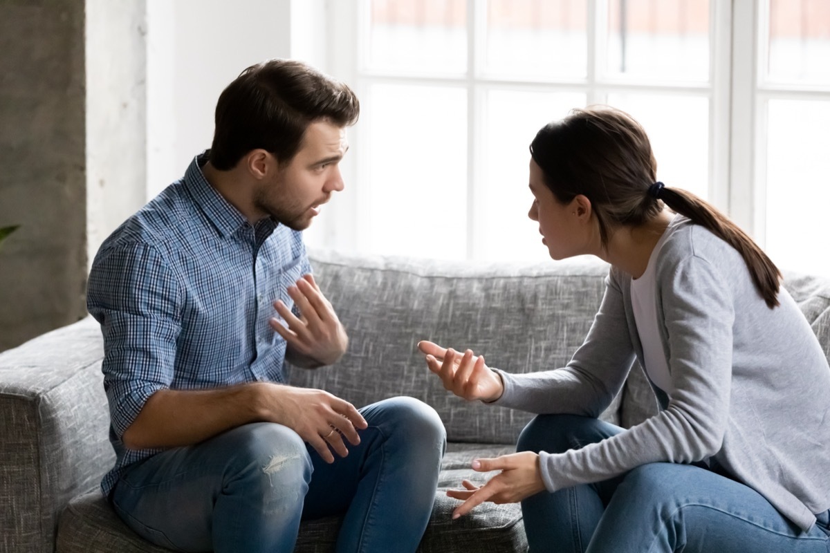 married couple arguing and blaming each other