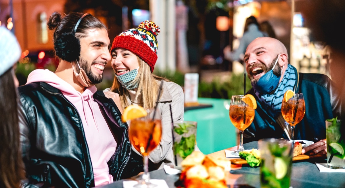 Friends at dinner without masks