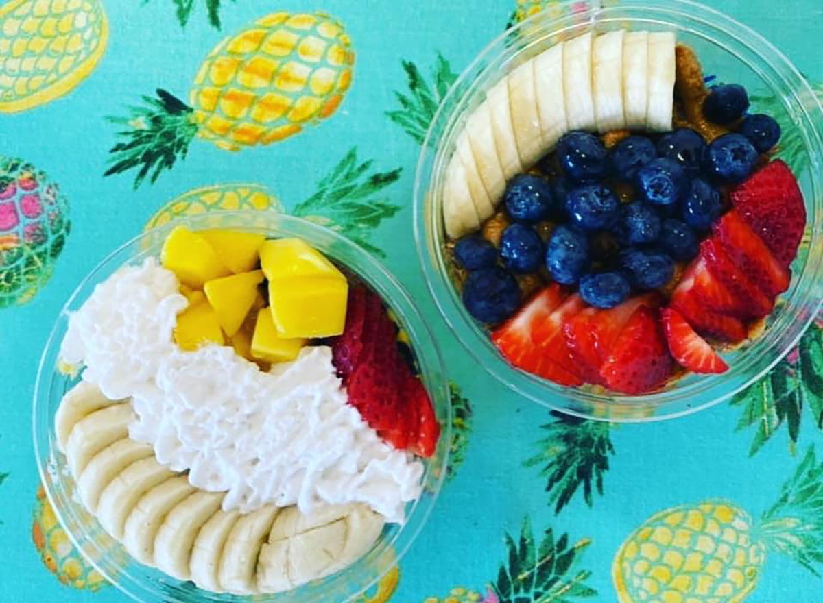 two acai bowls on pineapple printed pattern