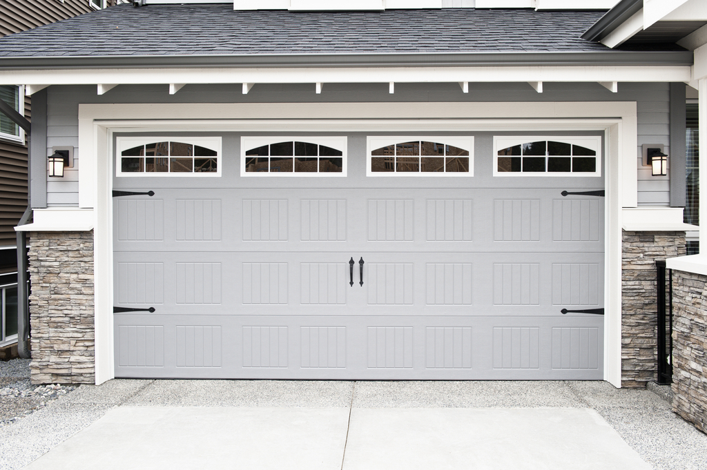 gray garage door with windows