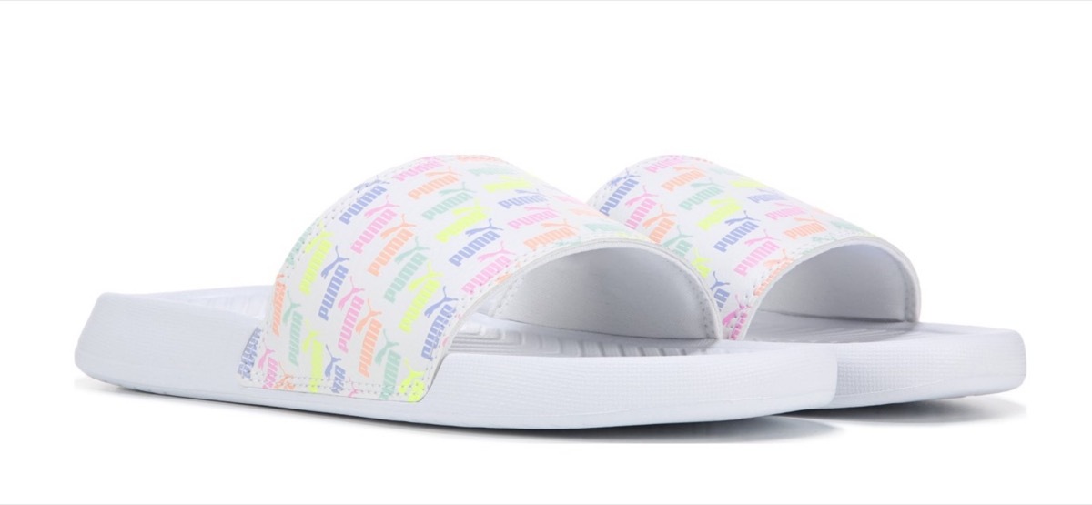 white slides with multicolor puma logos, affordable sandals