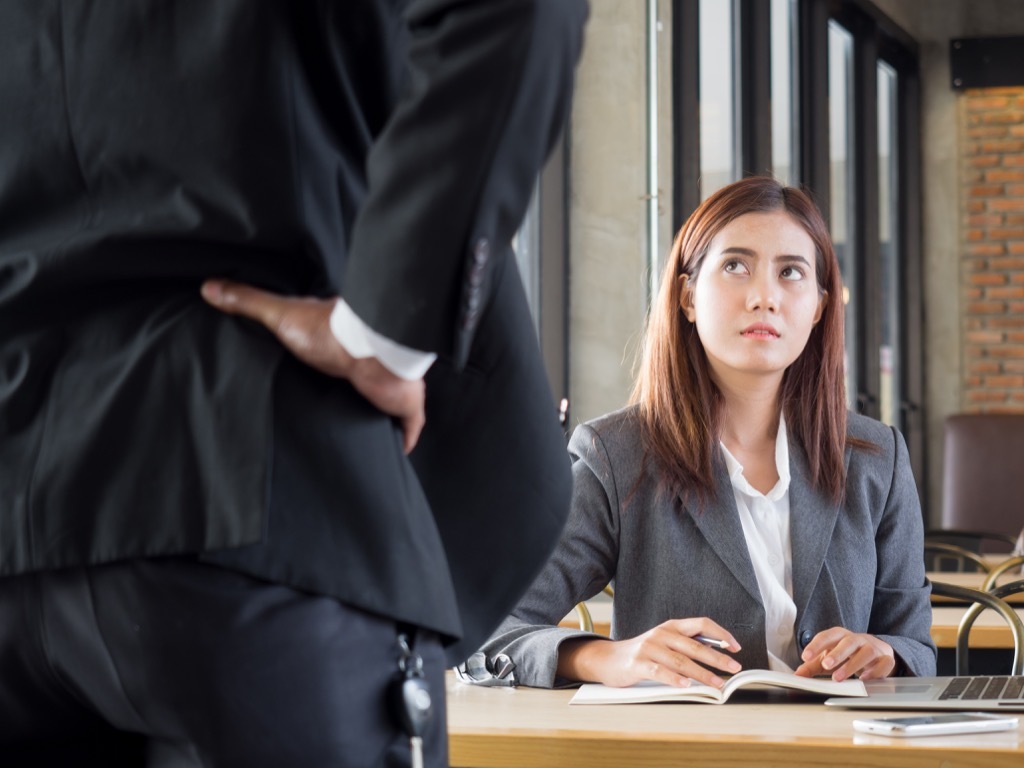 Woman Apologizing to Boss