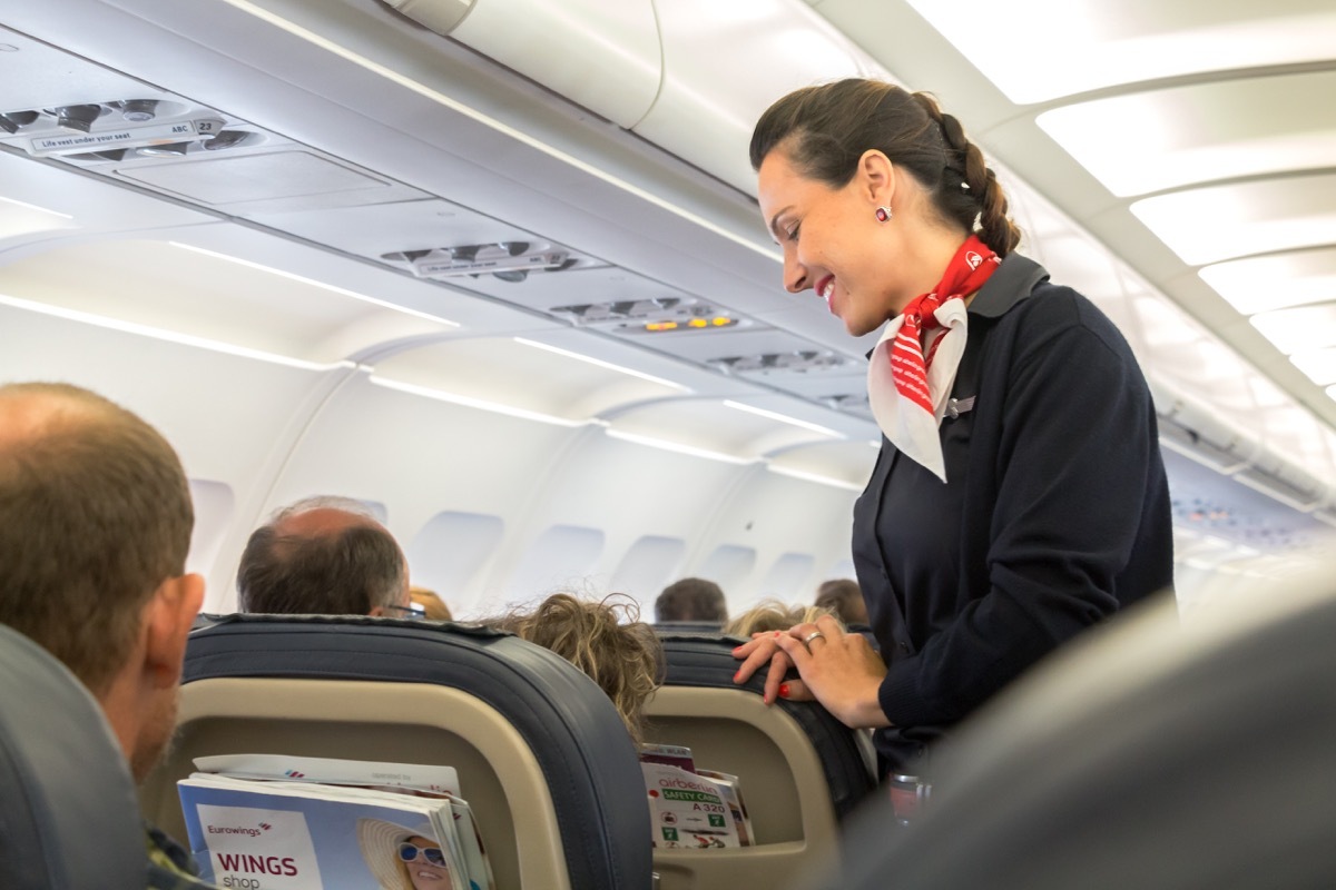 flight attendant talking to man things that horrify flight attendants