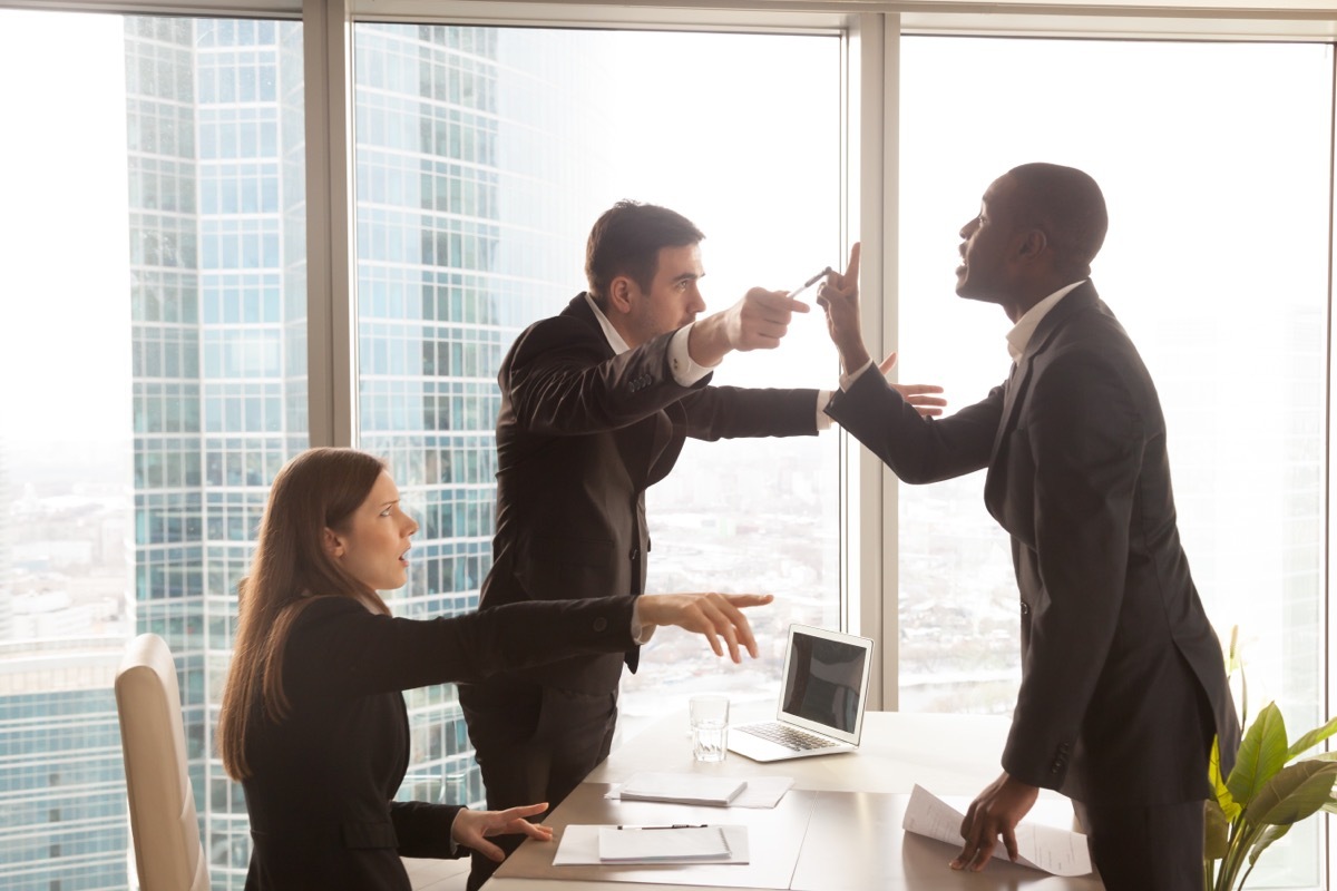 People fighting in Office