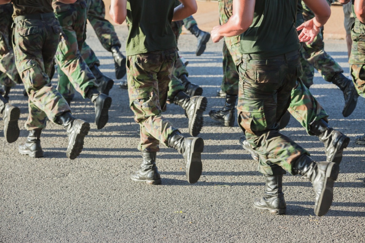 legs of military men running