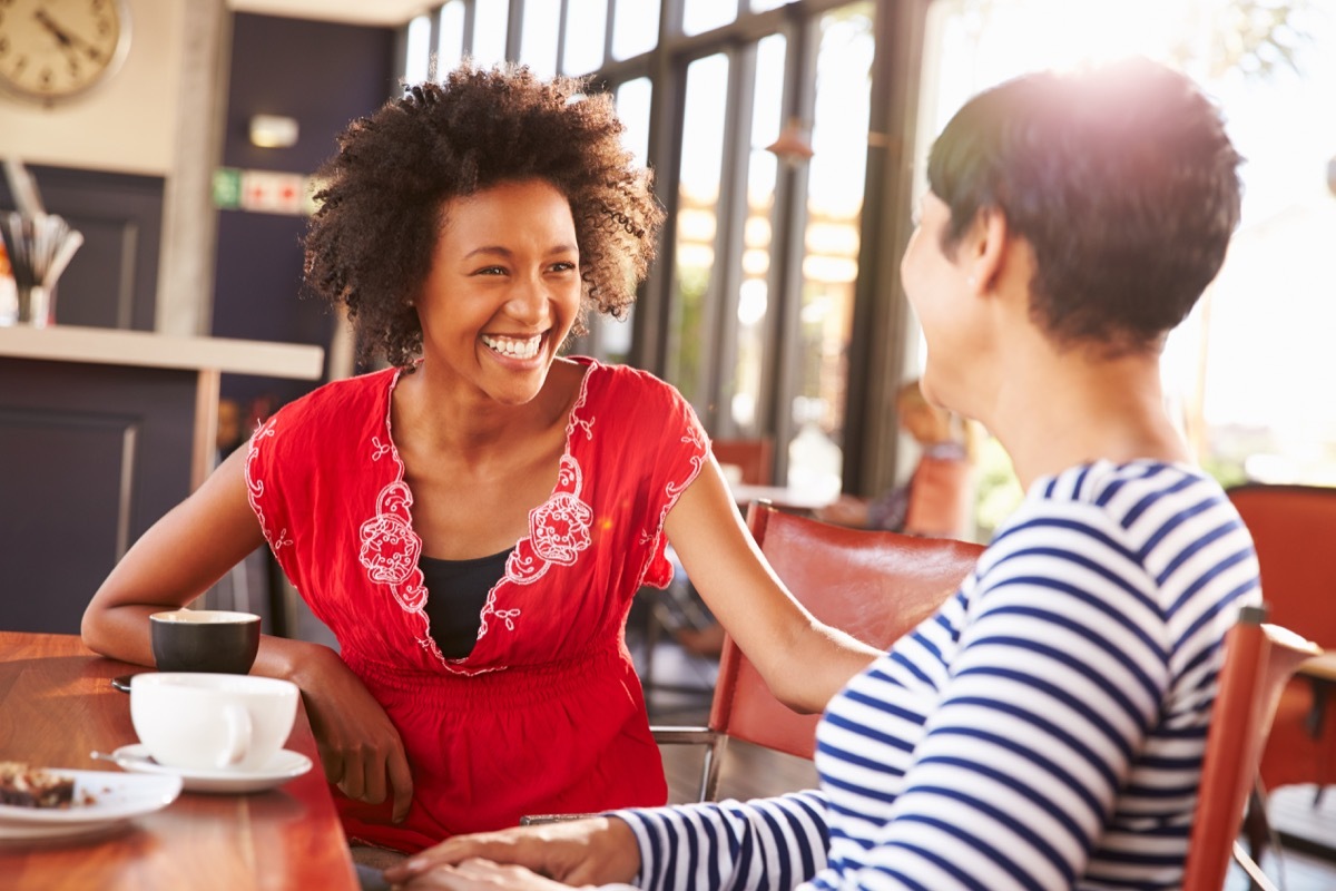 female friends talking at a coffee shop