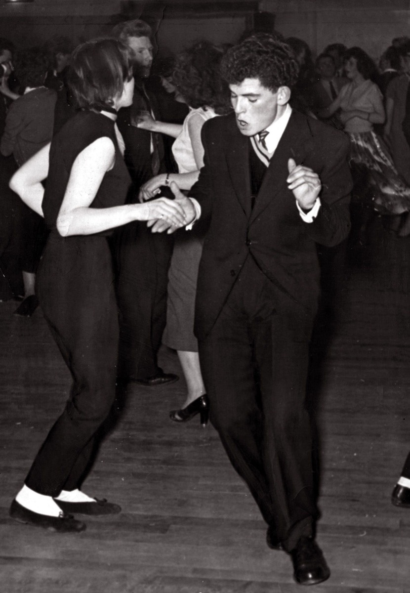 1950s young couple jive dancing, cool grandparents