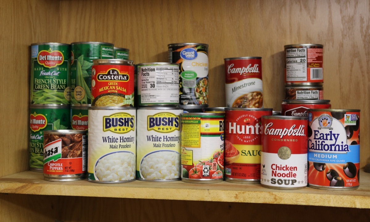 Assortment of Canned Goods on Shelf