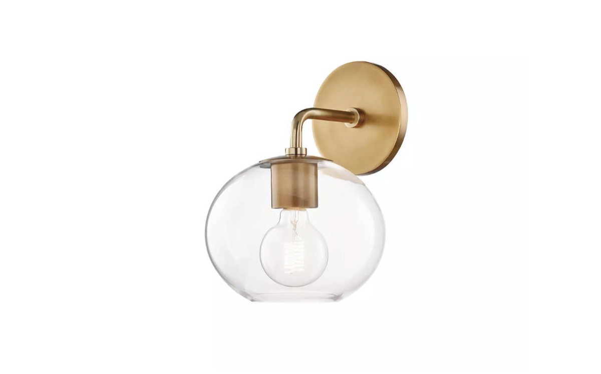 brass sconce light with glass globe