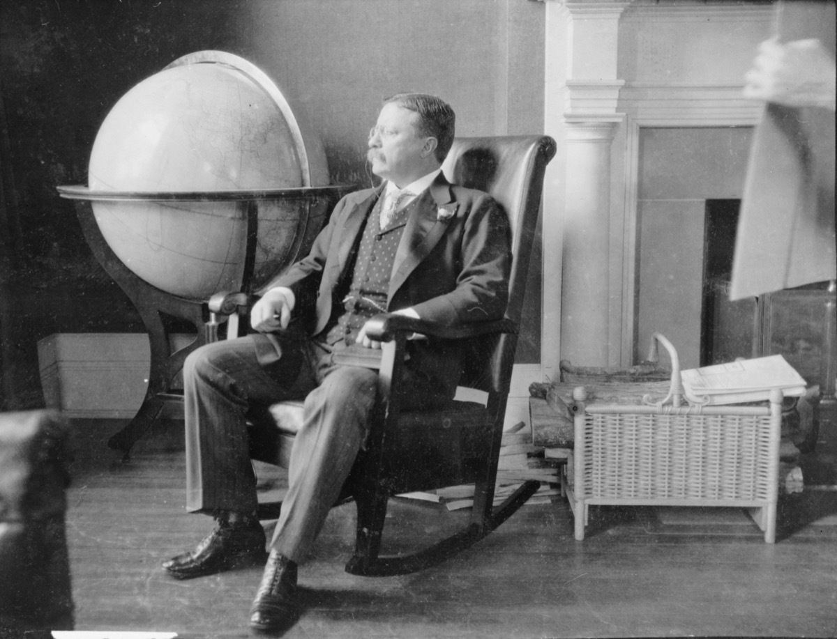 Theodore Roosevelt, at the end of his presidency, seated in rocking chair