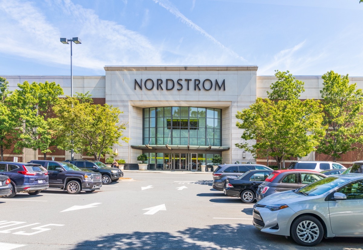 CHARLOTTE, NC, USA-28 July 19: Entrance to Nordstrom Department store, with crowded parking lot on a sunny summer day. (CHARLOTTE, NC, USA-28 July 19: Entrance to Nordstrom Department store, with crowded parking lot on a sunny summer day., ASCII, 119