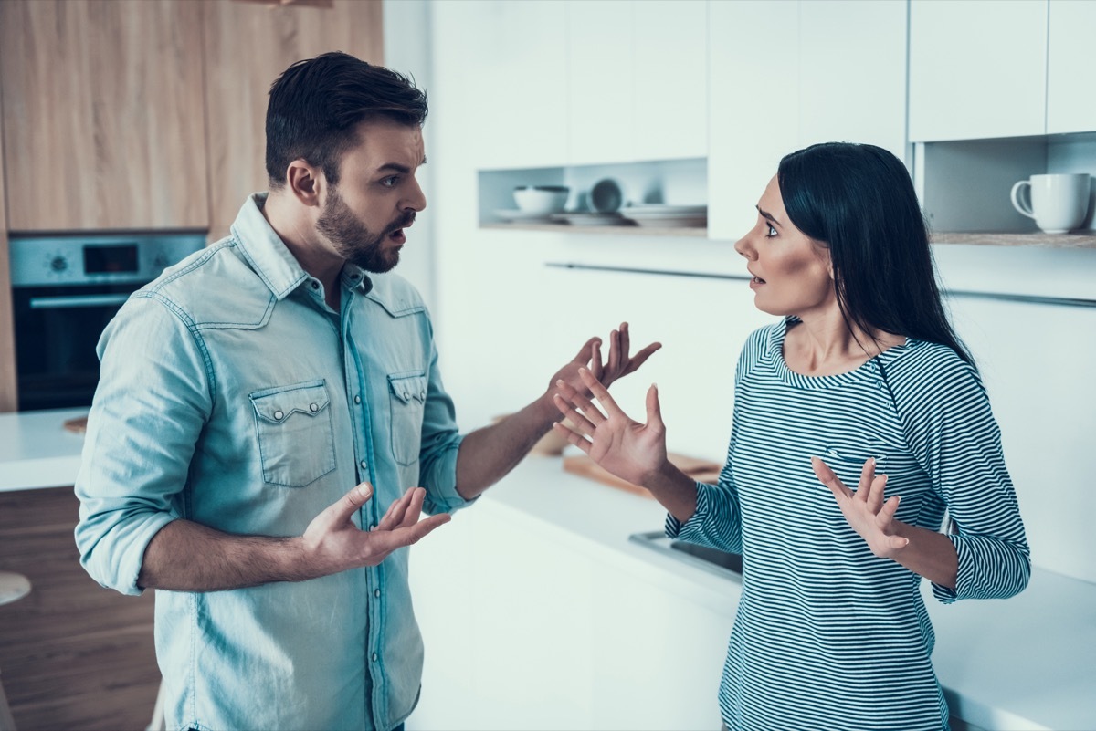 Couple having an argument in the kitchen