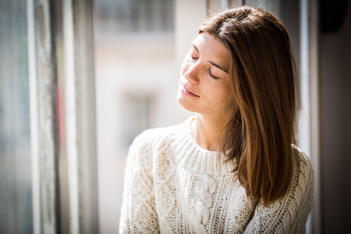 woman soaking in sun in the winter as she lacks vitamin D