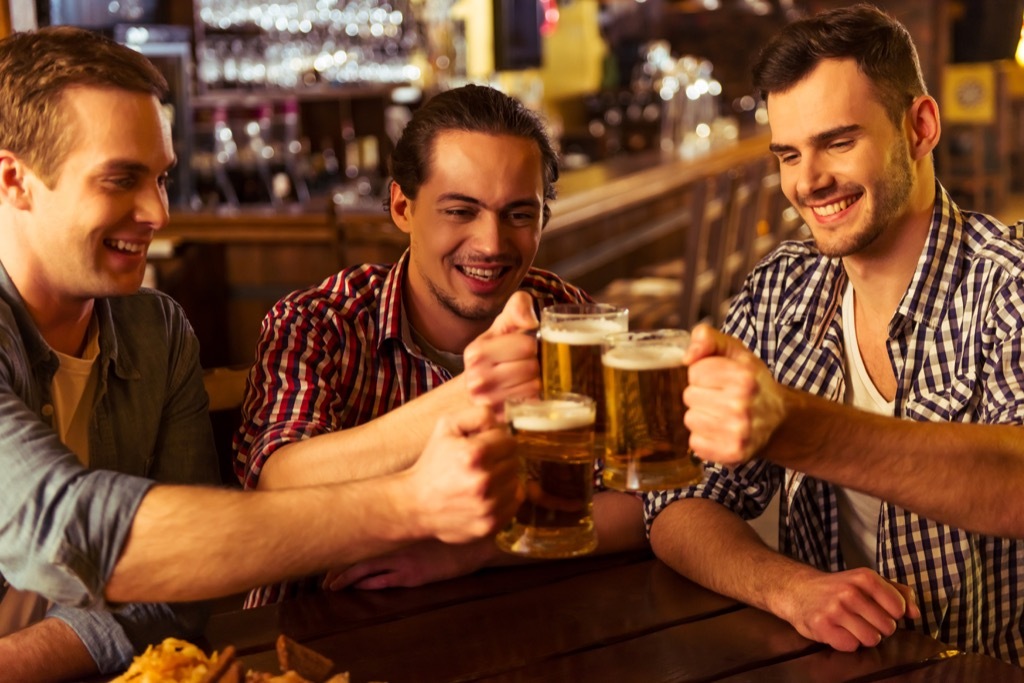 men drinking together