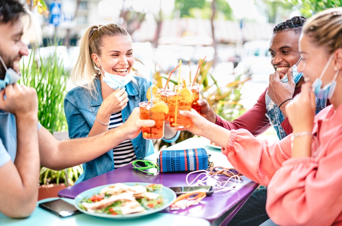 friends cheers at a restaurant