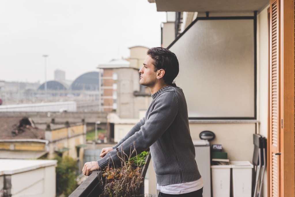 man on balcony