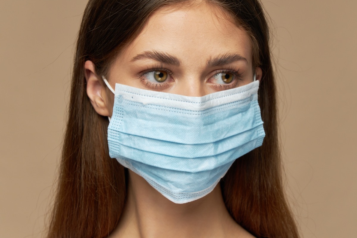 woman wearing loose surgical mask