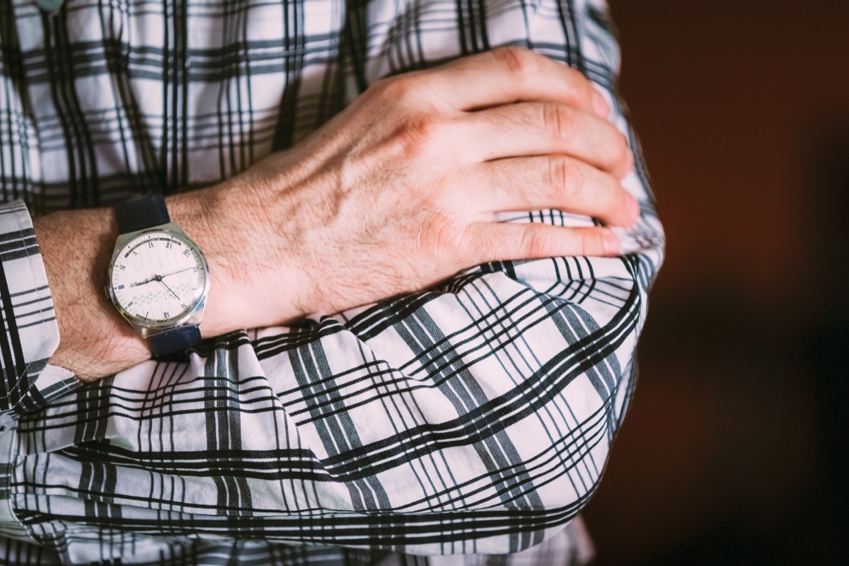 Man wearing an old watch