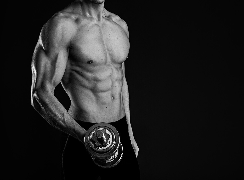 Man Holding Dumbbell boost Metabolism