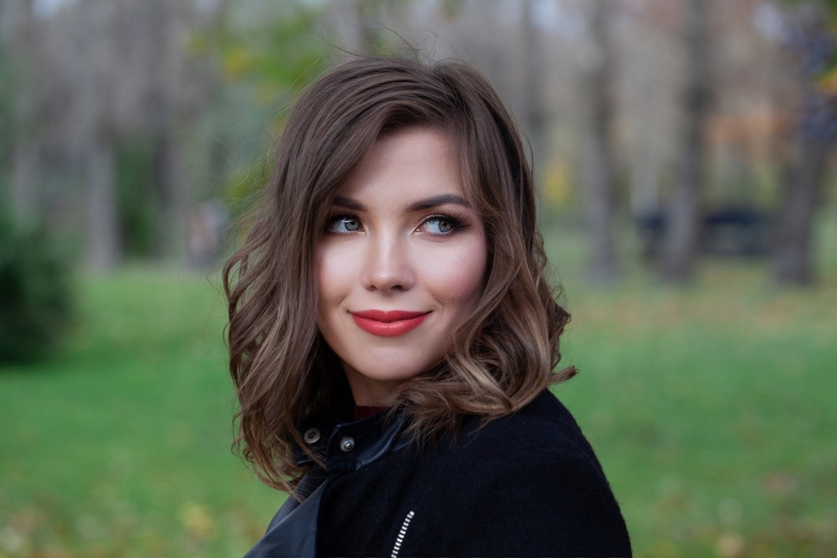 Young woman with long bob hairstyle outside