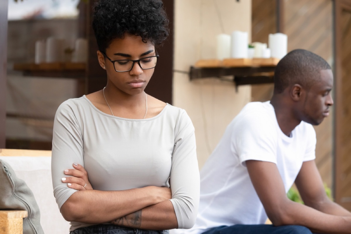 young black couple arguing on couch, things no spouse wants to hear