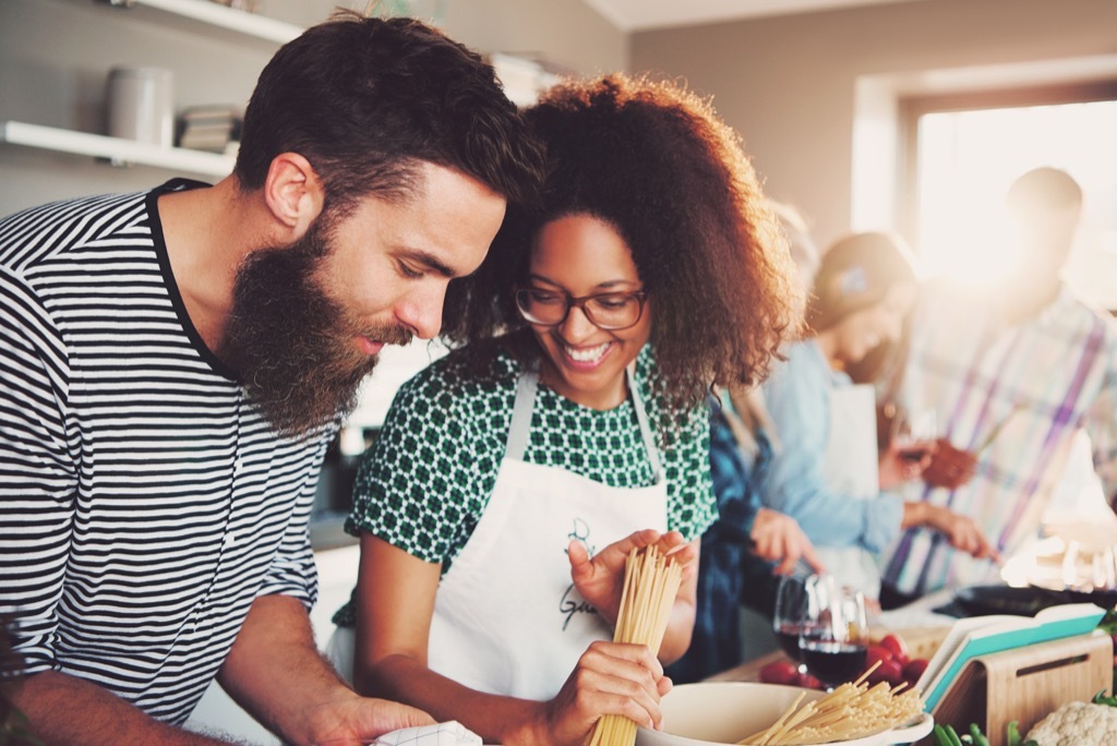 Man and woman taking cooking class together