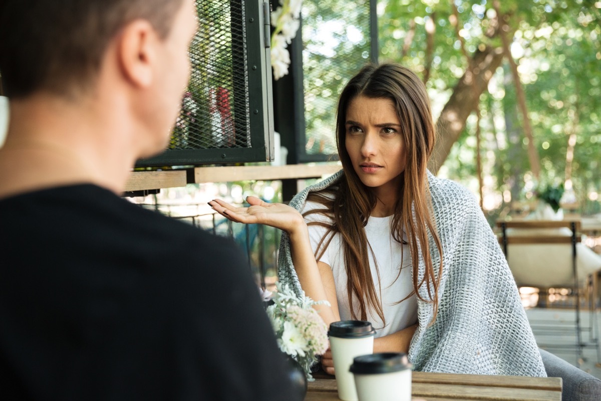 confused woman looking at man