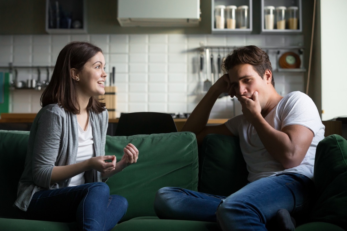 Man yawning during conversation