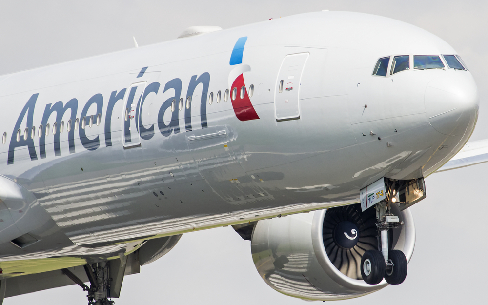 An American Airlines plane landing at an airport