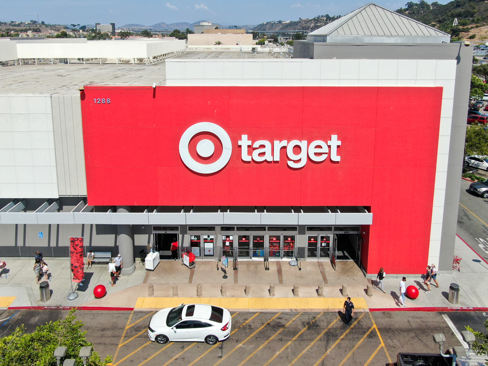 A Target storefront with customers entering and exiting