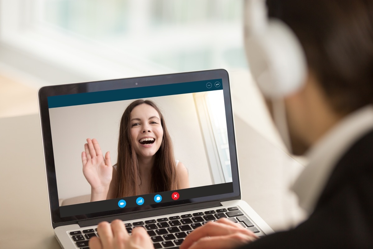 young white woman on virtual date or video call