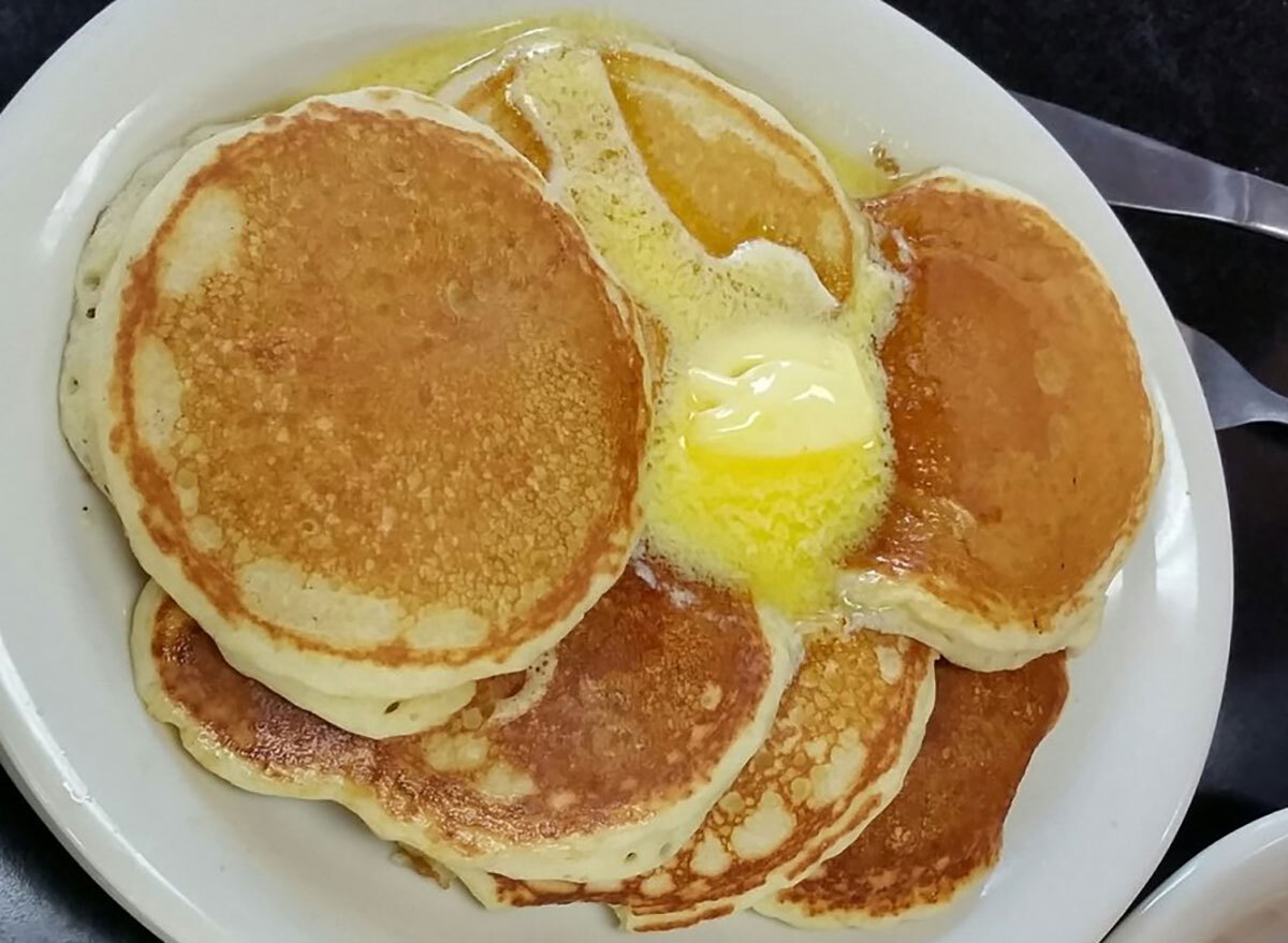 stack of silver dollar pancakes with butter