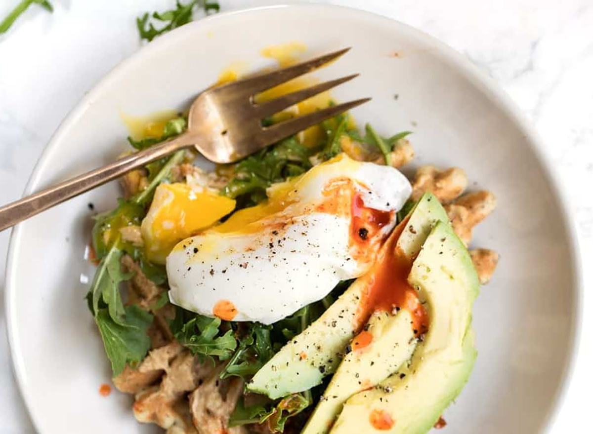 almond flour waffles topped with poached egg