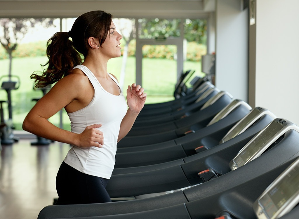 woman running on a treadmill