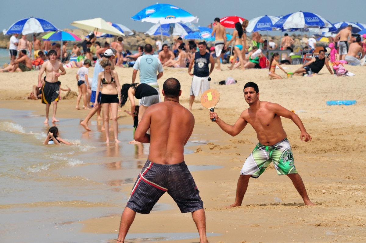 Soft wave of blue ocean on sandy beach