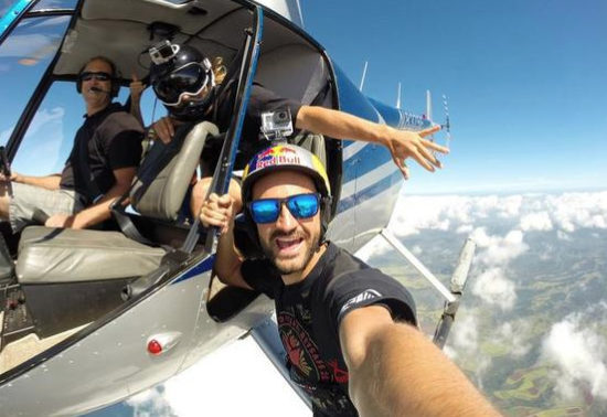 Man Hanging Outside of Helicopter Selfies