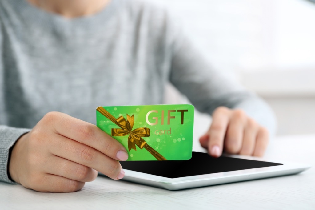 Woman Holding a Gift Card Mother's Day Gifts