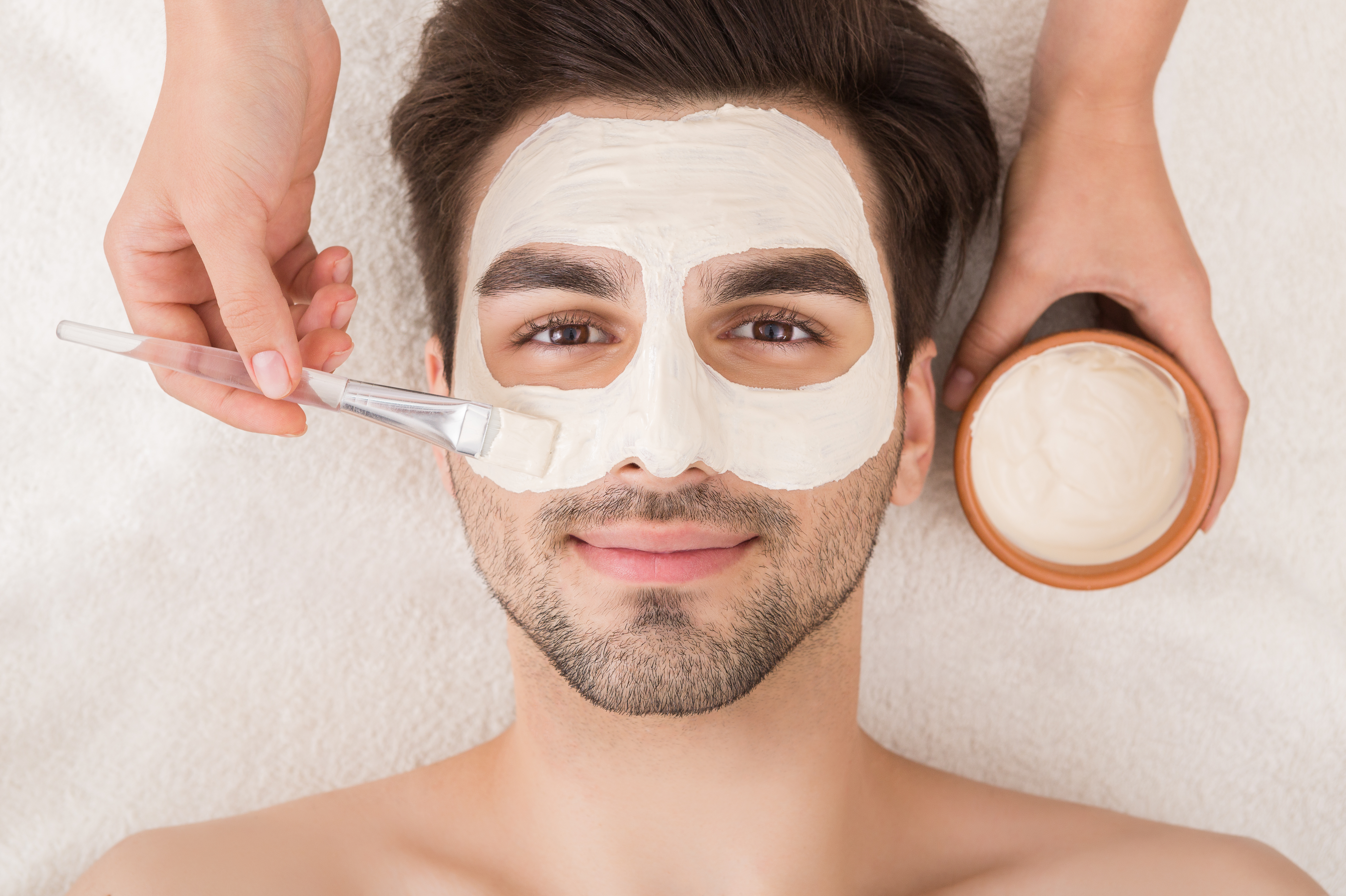 man getting a facial