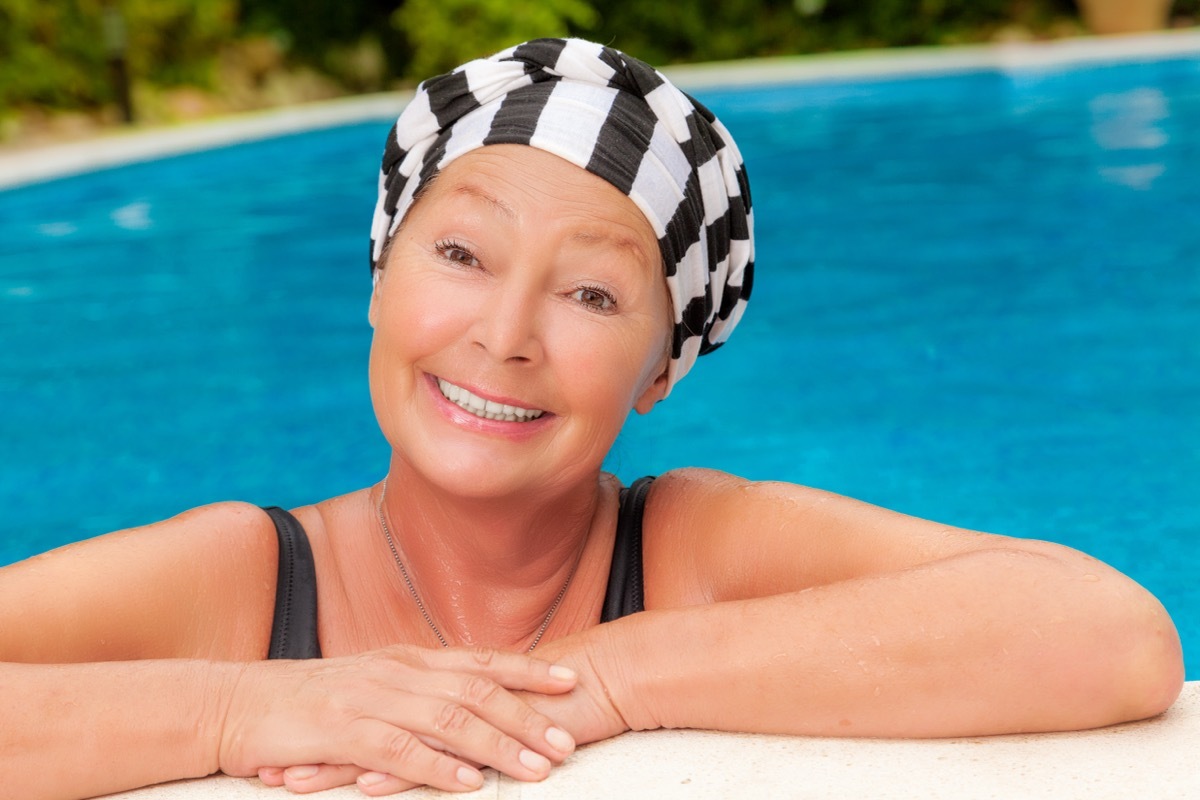 Older Woman Wearing Swim Cap in the Pool