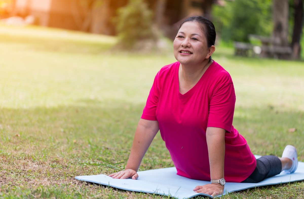 woman doing yoga, over 50 fitness