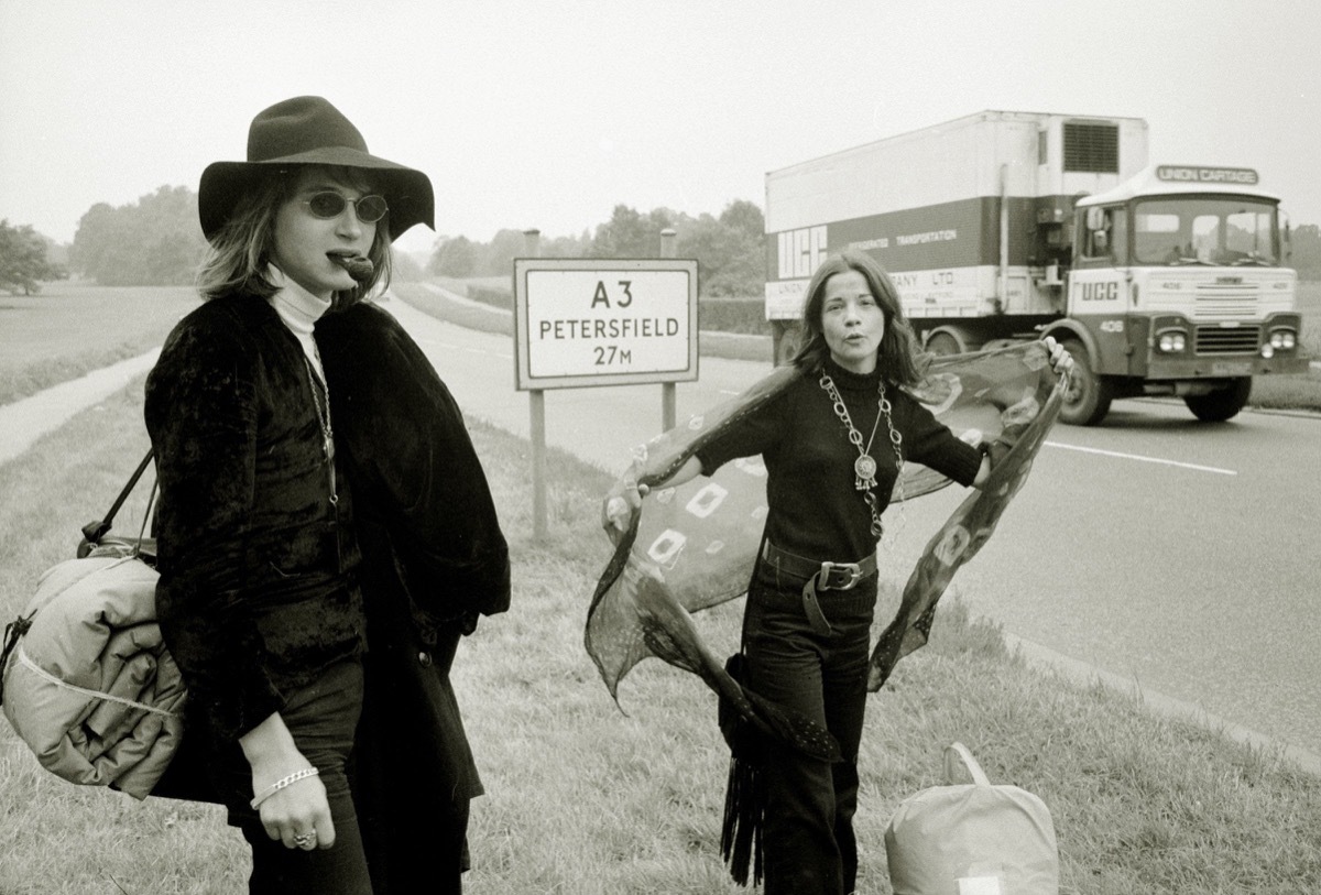 couple of girls hitch hiking, 1970s nostalgia