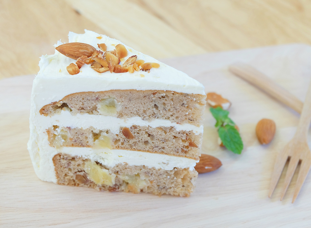 slice of hummingbird cake with cream cheese frosting