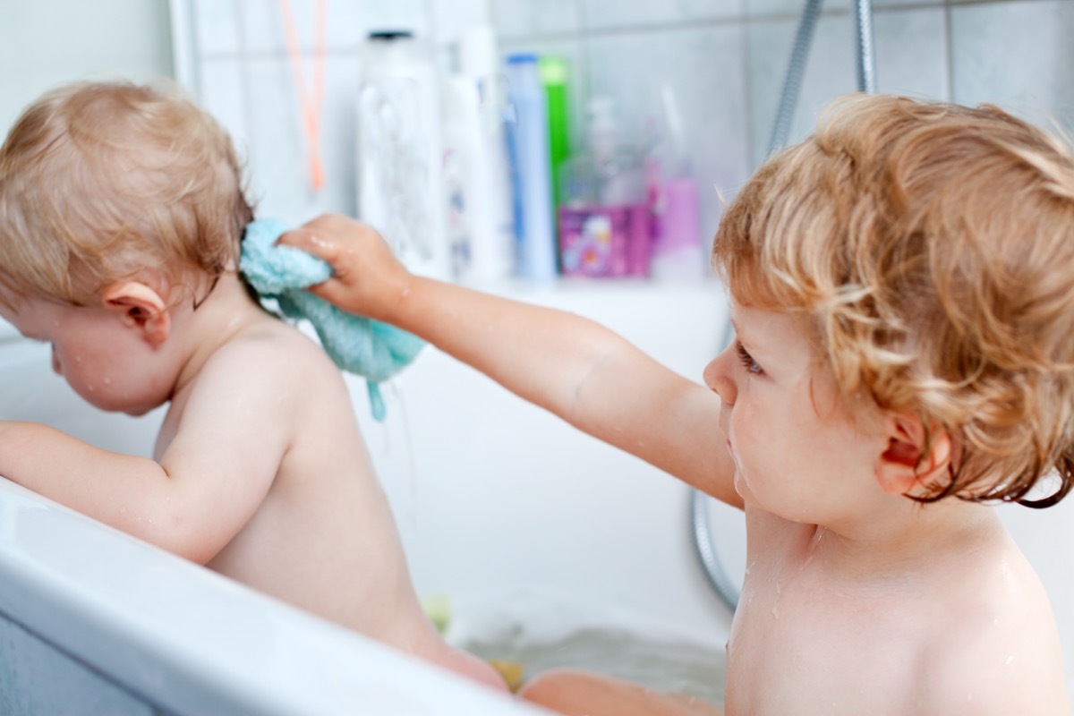 two white babies taking bath